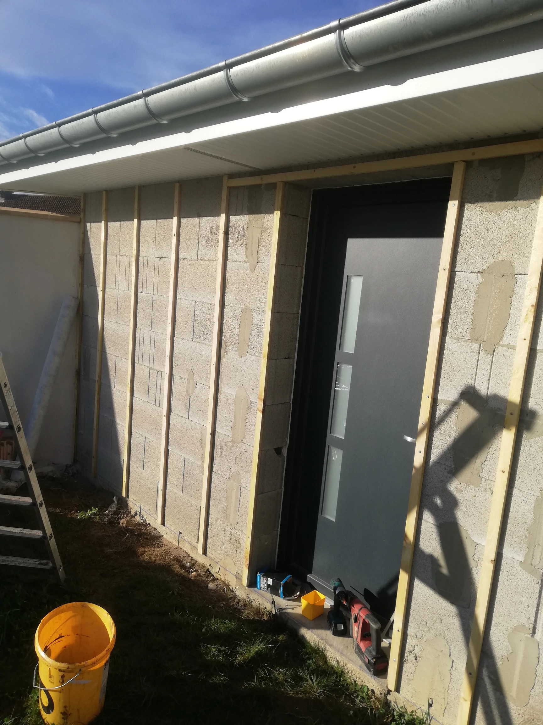 Pose de bardage composite