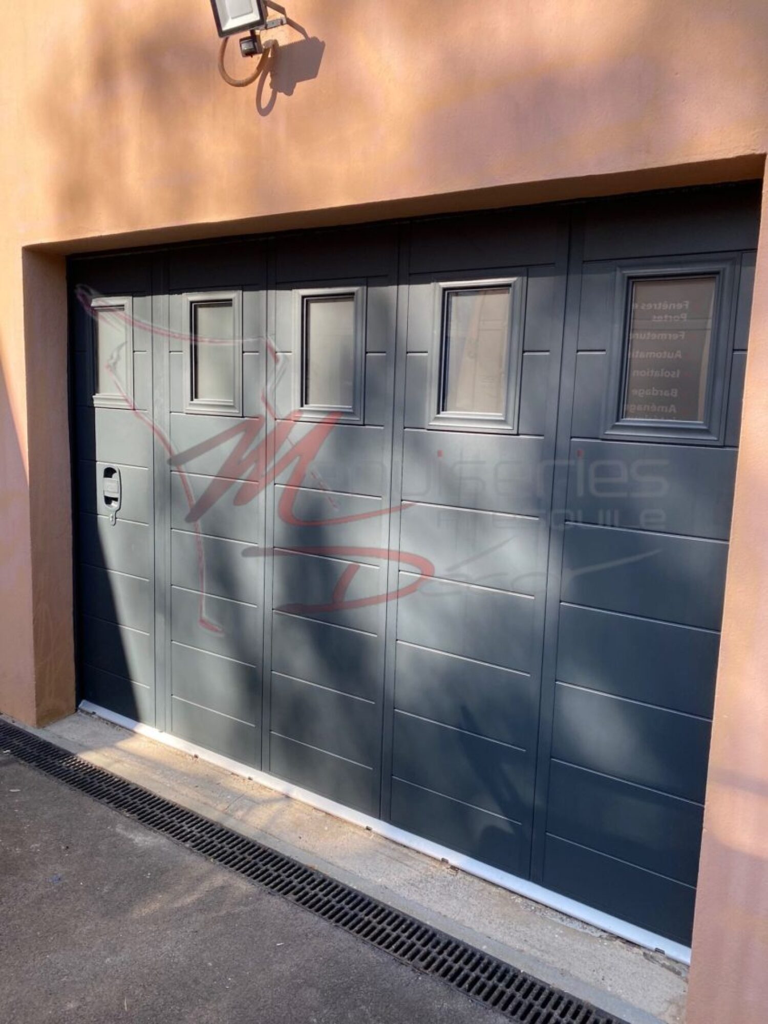 Porte de garage latérale coulissante