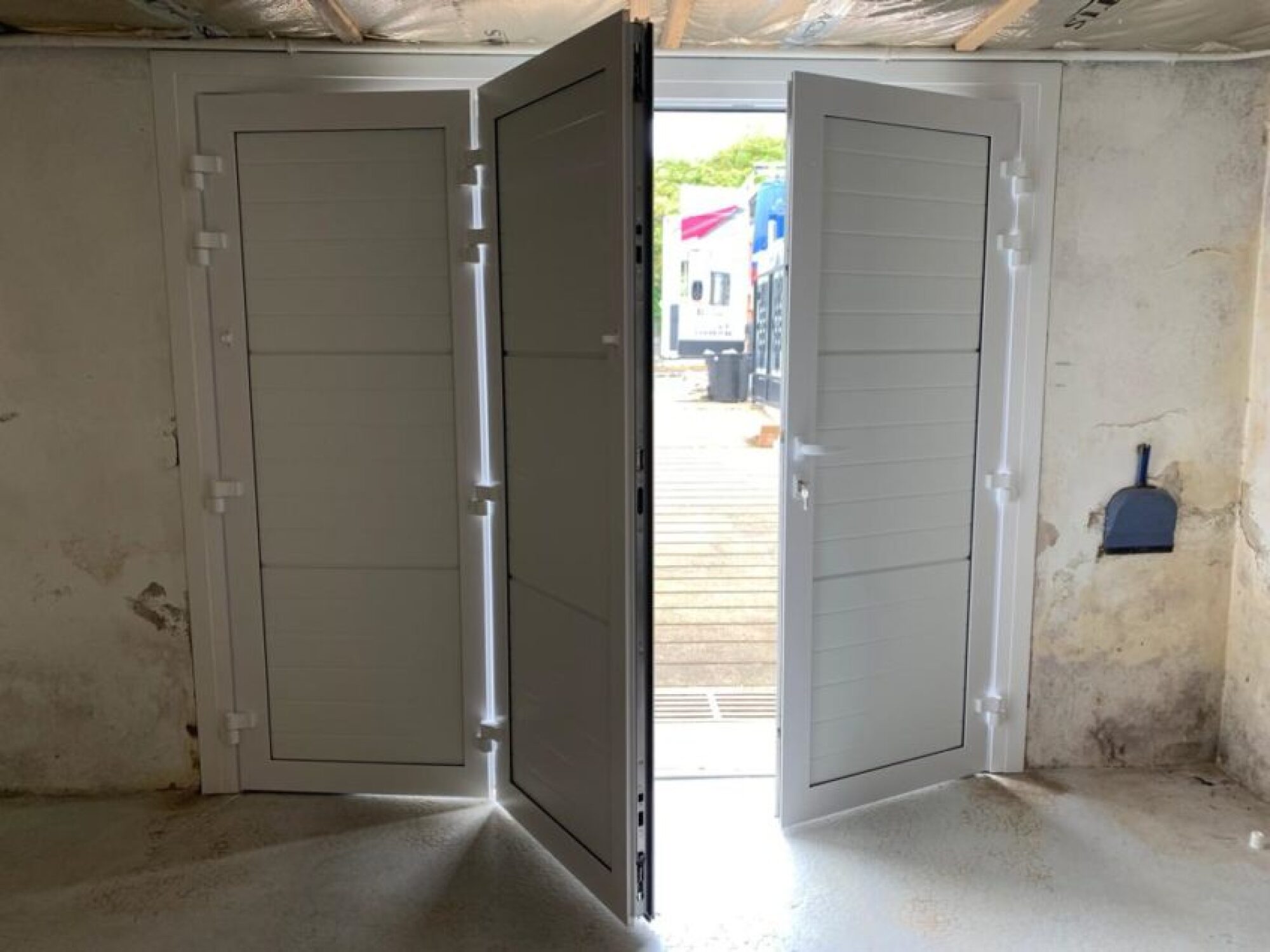 Pose porte de garage sur mesure