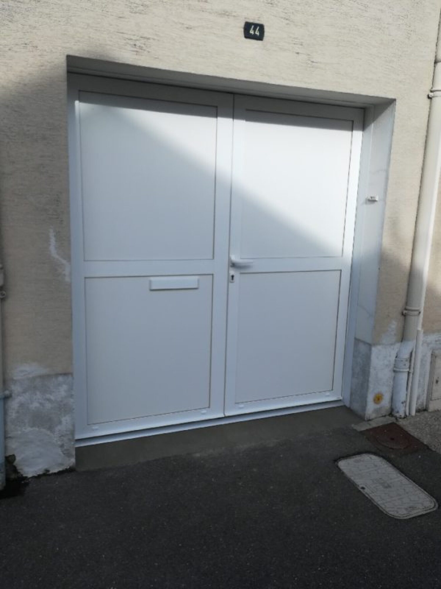 Porte de garage battante