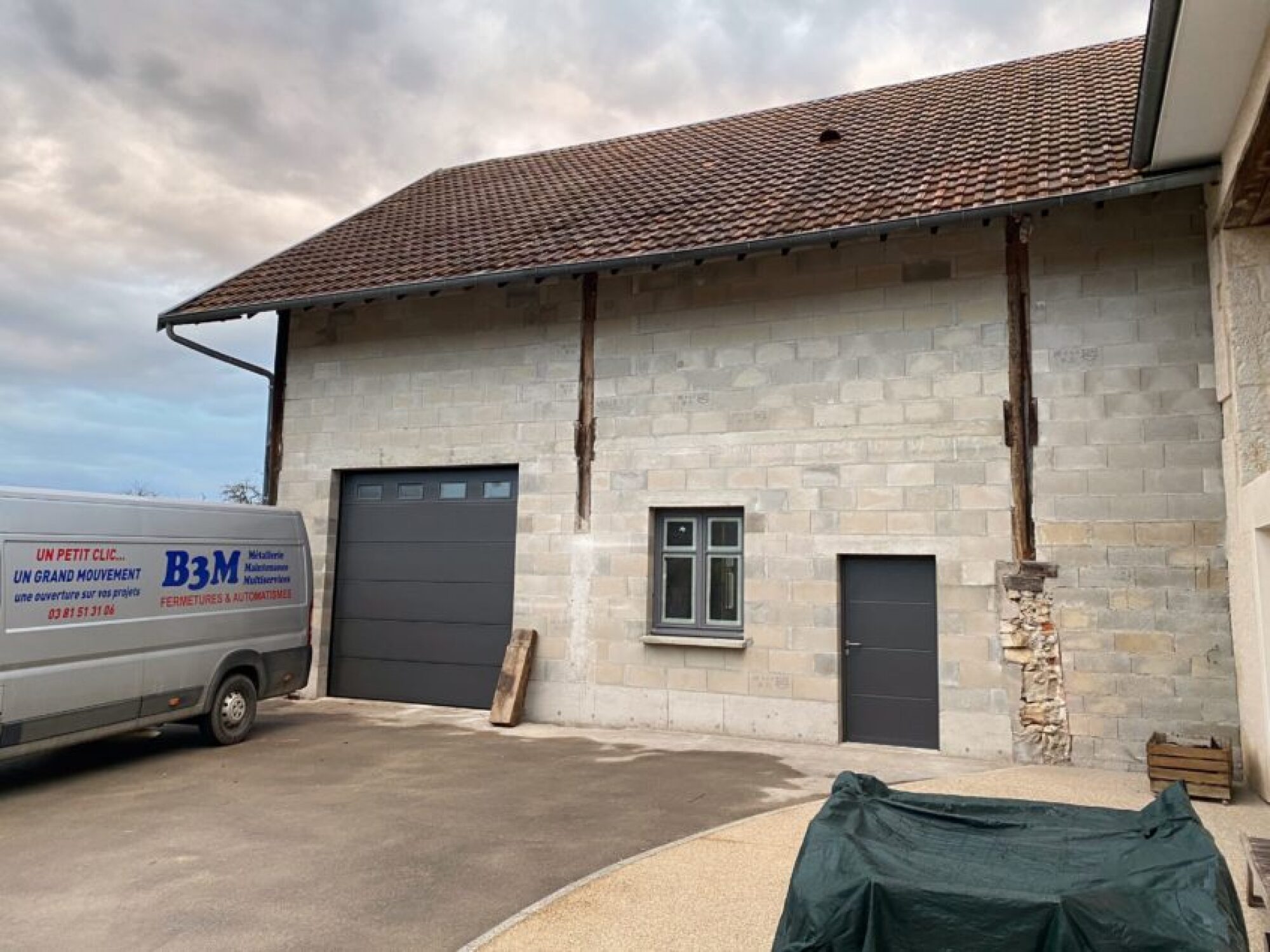 Pose et fourniture de porte sectionnelle