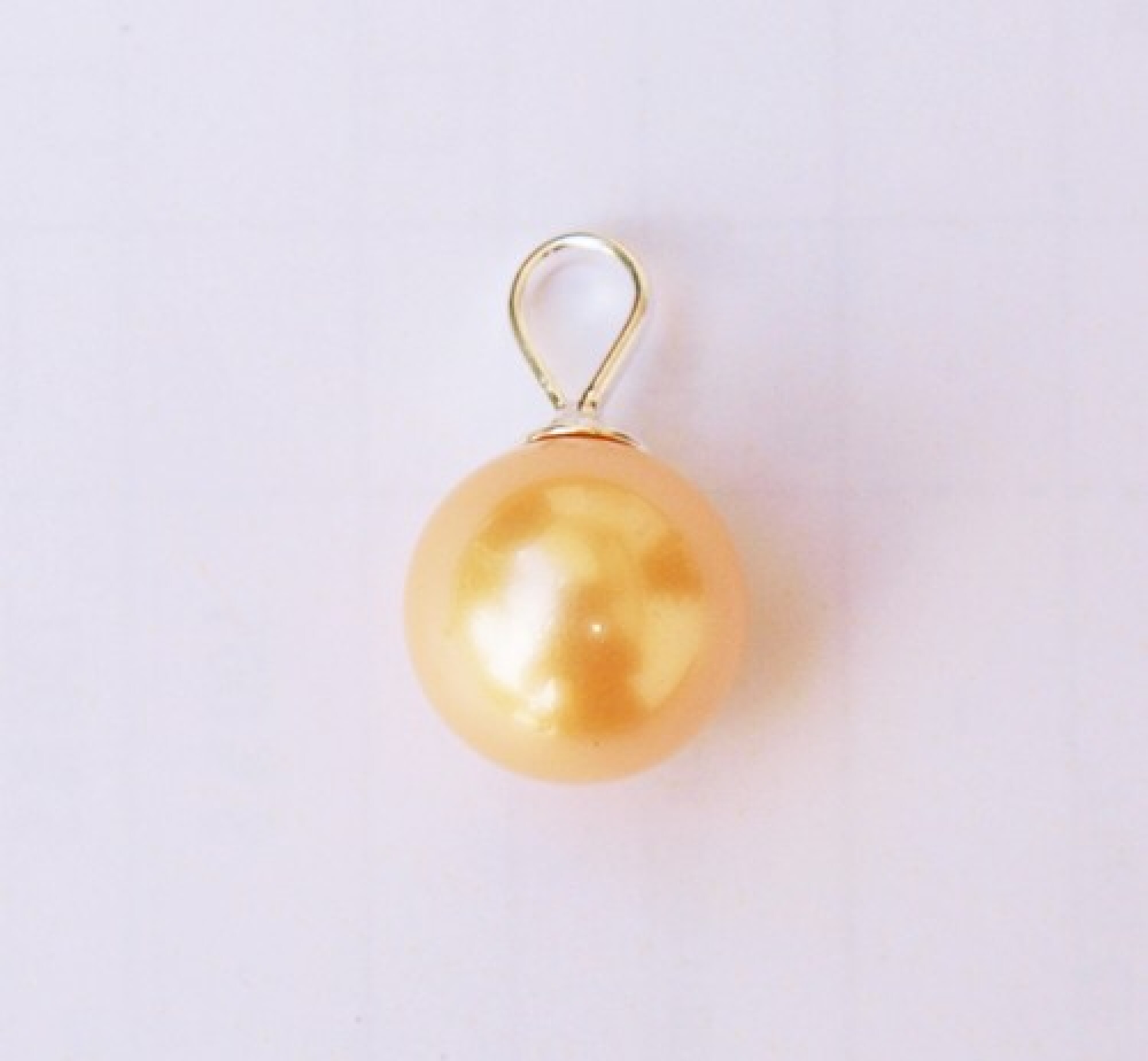 Pendentif boule en argent et perle couleur champagne