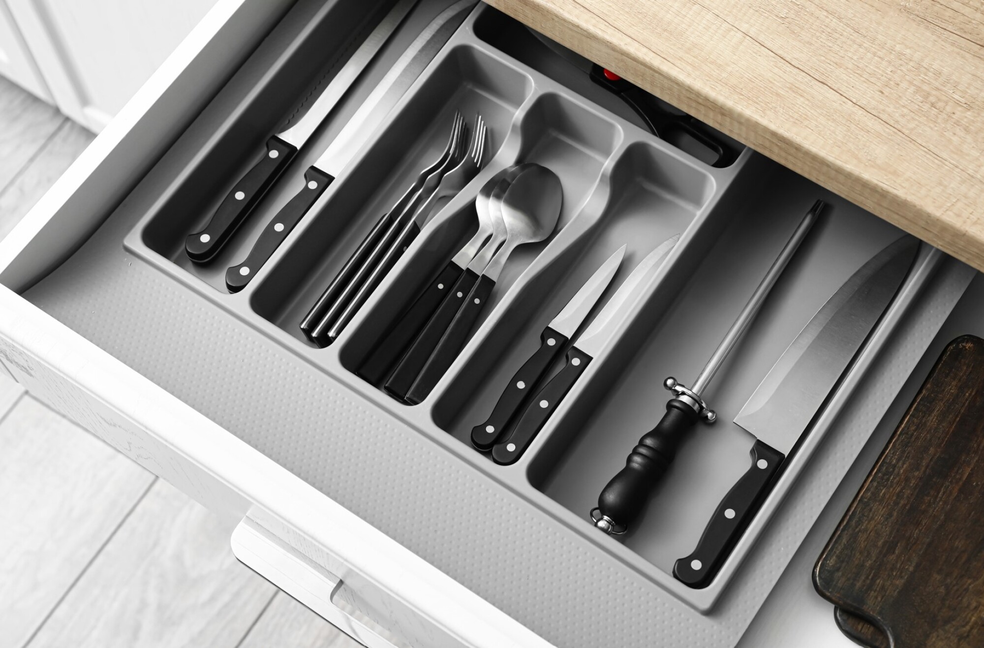 Pose de support ustensiles