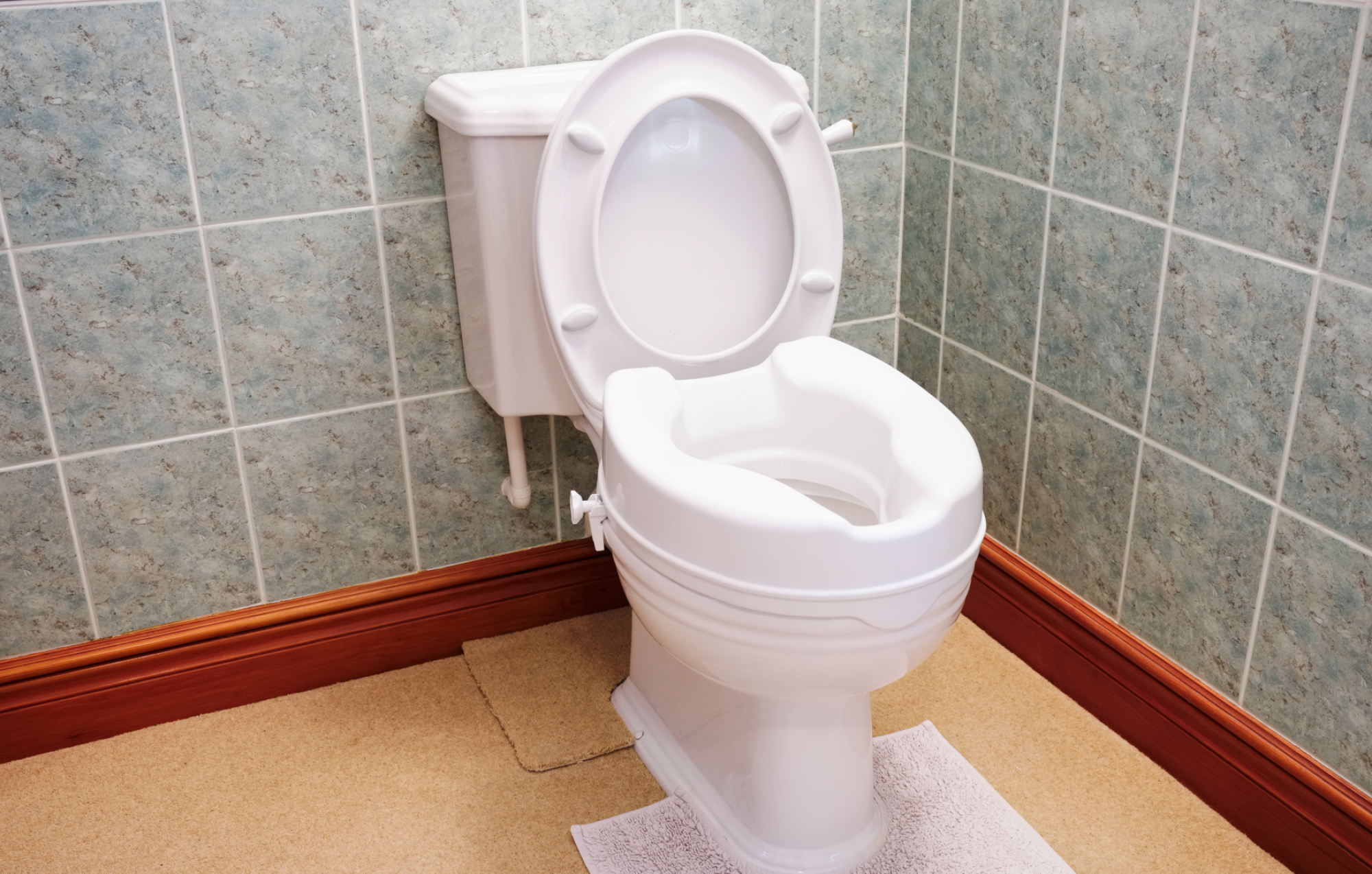 Installation d'un réhausse de WC