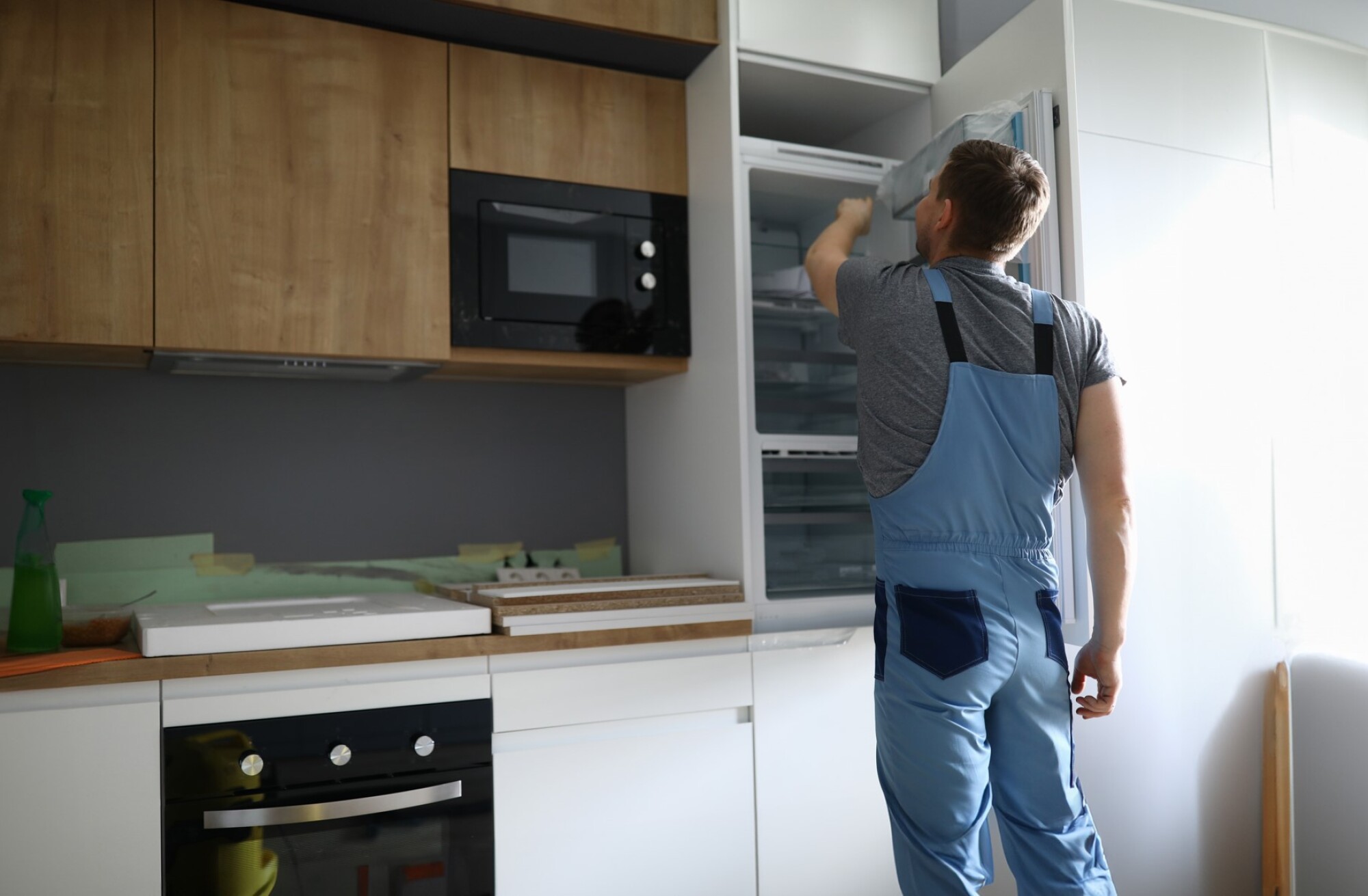 Mise en place réfrigérateur encastré