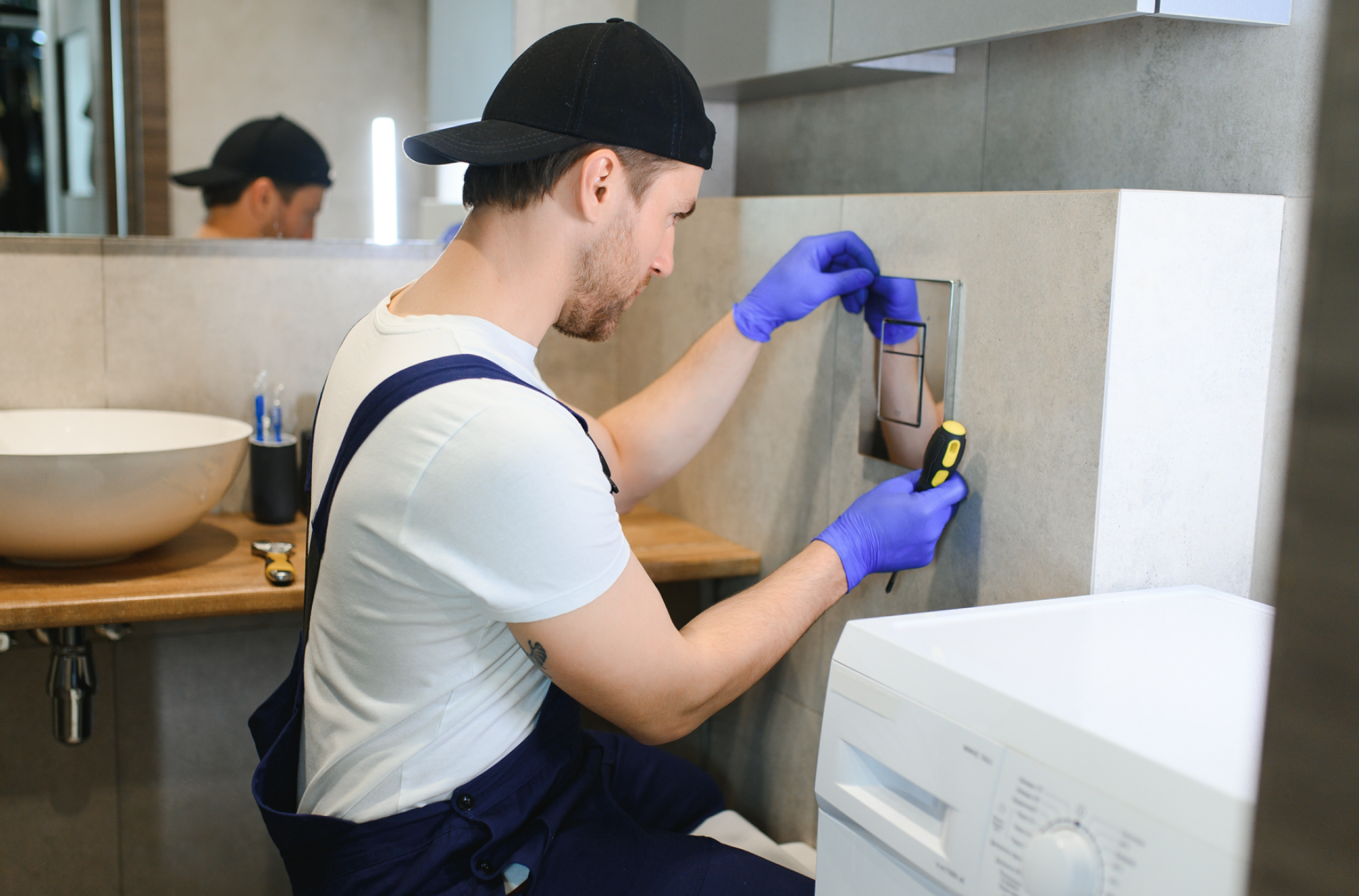 Remplacement d'une plaque de commande WC suspendu