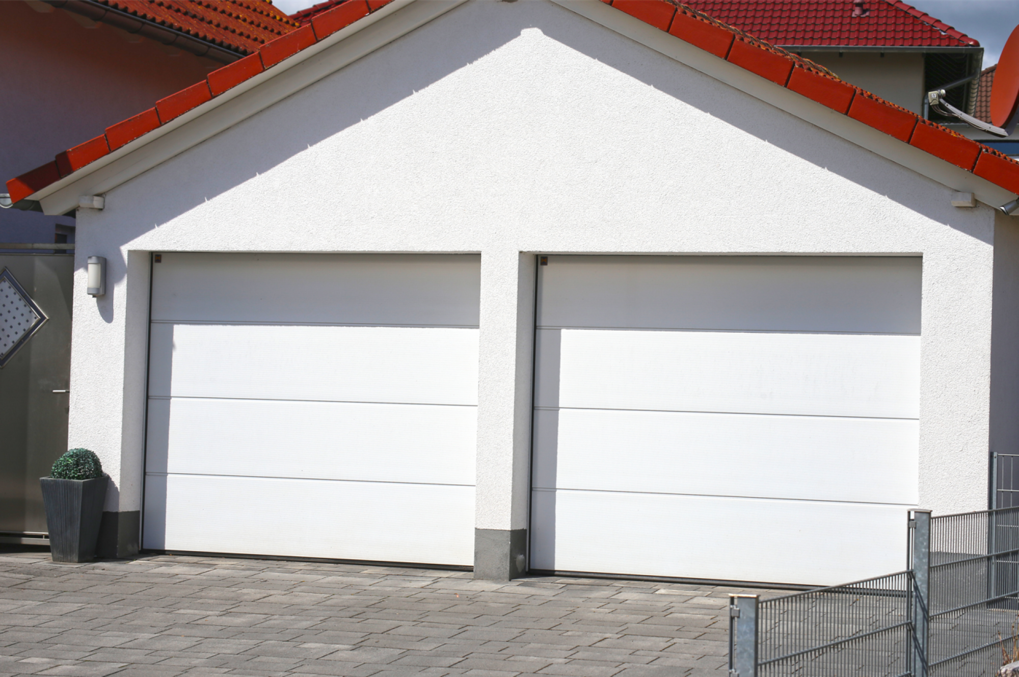 Réparation de porte de garage sectionnelle