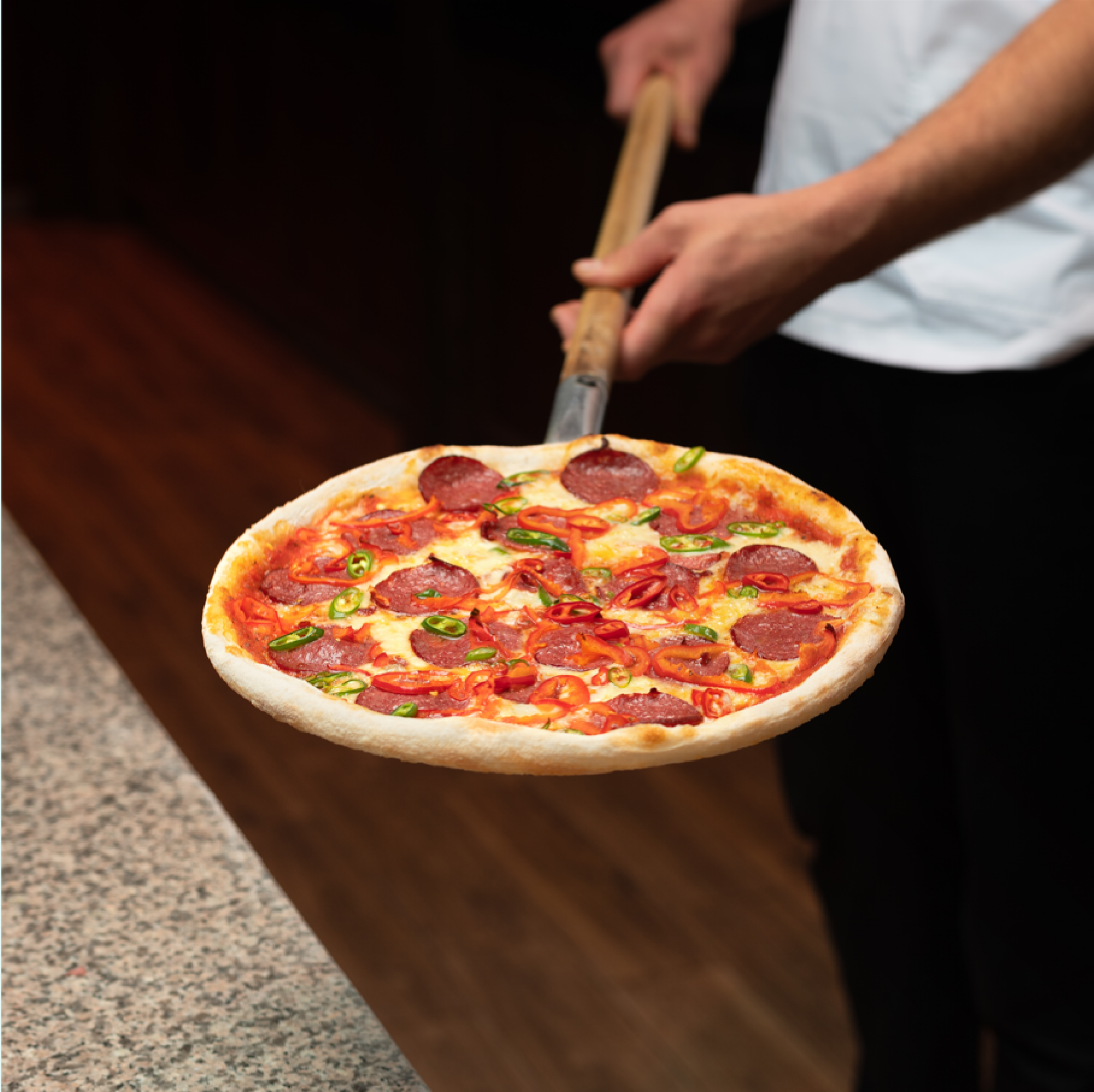 Pelle à pizza en bois